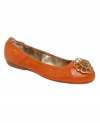 Brighten up a casual classic. The Vanna flats by Tahari feature a sparkling floral accent upon their rich leather upper.