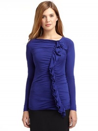 THE LOOKAsymmetrical necklineLong sleevesRuched front with ruffled detailTHE FITAbout 25 from shoulder to hemTHE MATERIALRayonCARE & ORIGINHand washMade in ItalyModel shown is 5'9 (175cm) wearing US size 4. THE LOOKAsymmetrical necklineLong sleevesRuched front with ruffled detailTHE FITAbout 25 from shoulder to hemTHE MATERIALRayonCARE & ORIGINHand washMade in ItalyModel shown is 5'9 (175cm) wearing US size 4.