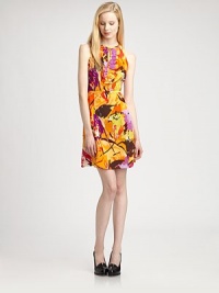 As vivid as a fall bouquet, this exquisite silk dress has a floral print, ruffle overlay and front keyhole detail. RoundneckFront keyhole closureRuffle overlayBack zipperAbout 20 from natural waistSilkDry cleanMade in USA of imported fabricModel shown is 5'11 (178cm) wearing US size 2. As vivid as a fall bouquet, this exquisite silk dress has a floral print, ruffle overlay and front keyhole detail. RoundneckFront keyhole closureRuffle overlayBack zipperAbout 20 from natural waistSilkDry cleanMade in USA of imported fabricModel shown is 5'11 (178cm) wearing US size 2.