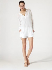 Perfect over skinny jeans or your vibrant bikini, this semi-sheer tunic has dropped shoulders, long dolman sleeves and an ultra-lengthy silhouette. V-neckDropped shouldersLong dolman sleevesLonger length hits below the hipsSilkDry cleanImportedModel shown is 5'10 (177cm) wearing US size Small. Perfect over skinny jeans or your vibrant bikini, this semi-sheer tunic has dropped shoulders, long dolman sleeves and an ultra-lengthy silhouette. V-neckDropped shouldersLong dolman sleevesLonger length hits below the hipsSilkDry cleanImportedModel shown is 5'10 (177cm) wearing US size Small.