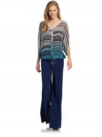 THE LOOKAbstract printSemi-sheer designWide necklineShort dolman sleevesFront button closureDip-dyed hemDrawstring hemTHE FITAbout 25 from shoulder to hemTHE MATERIALSilkCARE & ORIGINDry cleanMade in USAModel shown is 5'11 (180cm) wearing US size Small. THE LOOKAbstract printSemi-sheer designWide necklineShort dolman sleevesFront button closureDip-dyed hemDrawstring hemTHE FITAbout 25 from shoulder to hemTHE MATERIALSilkCARE & ORIGINDry cleanMade in USAModel shown is 5'11 (180cm) wearing US size Small.