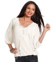 The peasant style is made modern with this shadow-striped GUESS top -- perfectly paired with denim! The peasant style is made modern with this shadow-striped GUESS top -- perfectly paired with denim!