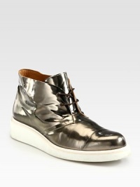 Urban-inspiration, portrayed in a lace-up, ankle boot style, finished with glossy, metallic leather.Leather upperLeather liningRubber soleImported Urban-inspiration, portrayed in a lace-up, ankle boot style, finished with glossy, metallic leather.Leather upperLeather liningRubber soleImported