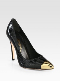 Vintage-inspired pump of snake-embossed patent leather with a gleaming metal point toe. Self-covered heel, 4½ (115mm)Snake-print patent leather upper and metal toe capPointed metal toe capLeather lining and solePadded insoleImported
