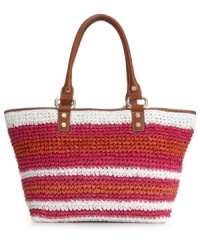 An adorable straw shopper with cheerful stripes. This DKNY style is great for the beach or the city, featuring vibrant colors and luxe leather trim. An adorable straw shopper with cheerful stripes. This DKNY style is great for the beach or the city, featuring vibrant colors and luxe leather trim.