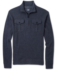 This DKNY Jeans sweater has a classy zip neck design and a cozy fit. This DKNY Jeans sweater has a classy zip neck design and a cozy fit.