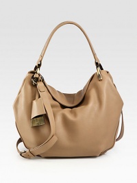 Luxurious pebbled leather in a roomy carryall, perfectly sized for all your essentials.Top handle, 6 dropDetachable adjustable shoulder strap, 21½-24 dropZip top closuresTwo inner compartmentsOne inside zip pocketTwo inside open pocketsLeather lining16W X 11½H X 5½DImported Luxurious pebbled leather in a roomy carryall, perfectly sized for all your essentials.Top handle, 6 dropDetachable adjustable shoulder strap, 21½-24 dropZip top closuresTwo inner compartmentsOne inside zip pocketTwo inside open pocketsLeather lining16W X 11½H X 5½DImported