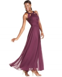 A fitted, pleated bodice with a sequined neckline beautifully contrasts the full, flowing skirt of Alex Evenings' gown. A fitted, pleated bodice with a sequined neckline beautifully contrasts the full, flowing skirt of Alex Evenings' gown.