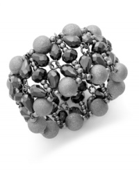 The soothing gray tones lend an alluring touch to this cuff bracelet from Alfani. With teardrop and round glass accents. Crafted in hematite tone mixed metal. Approximate length: 7-1/2 inches. Stretches to fit wrist. The soothing gray tones lend an alluring touch to this cuff bracelet from Alfani. With teardrop and round glass accents. Crafted in hematite tone mixed metal. Approximate length: 7-1/2 inches. Stretches to fit wrist.
