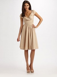 THE LOOKV-neckline Back zip closure with metal clover pull Pleated cap sleeves Pleated bodice Seam details Pleated waist Fully linedTHE FITAbout 40½ from shoulder to hemTHE MATERIALPolyesterCARE & ORIGINDry clean Imported THE LOOKV-neckline Back zip closure with metal clover pull Pleated cap sleeves Pleated bodice Seam details Pleated waist Fully linedTHE FITAbout 40½ from shoulder to hemTHE MATERIALPolyesterCARE & ORIGINDry clean Imported