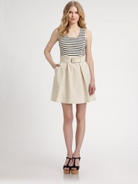 A cool design with a striped top, complemented by flattering Princess seams and a waist-defining A-line silhouette for a feminine, fashion-forward look. Round neckSleevelessPrincess seamsCinched detail at high waistSide zipperDenim tulip skirtBack yokeBack seamAbout 19 from natural waistCottonDry cleanImported Model shown is 5'10 (177cm) wearing US size 4. A cool design with a striped top, complemented by flattering Princess seams and a waist-defining A-line silhouette for a feminine, fashion-forward look. Round neckSleevelessPrincess seamsCinched detail at high waistSide zipperDenim tulip skirtBack yokeBack seamAbout 19 from natural waistCottonDry cleanImported Model shown is 5'10 (177cm) wearing US size 4.