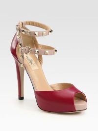 Amplify your look with this towering leather silhouette, topped with metal-studded adjustable ankle straps. Self-covered heel with studs, 4¾ (120mm)Hidden platform, 1 (25mm)Compares to a 3¾ heel (95mm)Leather upperLeather lining and solePadded insoleMade in ItalyOUR FIT MODEL RECOMMENDS ordering true size. Amplify your look with this towering leather silhouette, topped with metal-studded adjustable ankle straps. Self-covered heel with studs, 4¾ (120mm)Hidden platform, 1 (25mm)Compares to a 3¾ heel (95mm)Leather upperLeather lining and solePadded insoleMade in ItalyOUR FIT MODEL RECOMMENDS ordering true size.