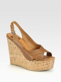 Strappy adjustable leather slingback with a natural cork wedge can be perfectly paired with your favorite sundress or shorts. Cork wedge, 4½ (115mm)Cork platform, 1½ (40mm)Compares to a 3 heel (75mm)Leather upperLeather liningRubber solePadded insoleImported Strappy adjustable leather slingback with a natural cork wedge can be perfectly paired with your favorite sundress or shorts. Cork wedge, 4½ (115mm)Cork platform, 1½ (40mm)Compares to a 3 heel (75mm)Leather upperLeather liningRubber solePadded insoleImported