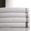 Contemporary supima cotton towels designed to tie back to the Hudson Park Premier solid towel. Mix and match or use alone. Perfect blend of decorative and utilitarian.