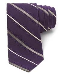 Slightly puckered trim abuts the stripes of this handsome tie, creating a subtle, complementary contrast texture for an overall design that suits your unique aesthetic. Slightly puckered trim abuts the stripes of this handsome tie, creating a subtle, complementary contrast texture for an overall design that suits your unique aesthetic.