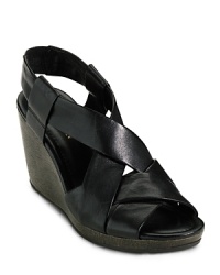 A bold platform sandal in big, bright color with a sleek wedge for beautifully balanced style. From Cole Haan.