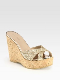 Raise the bar wearing this glittery staple with elegantly crisscrossed straps and a powerful cork wedge. Cork wedge, 4½ (115mm)Cork platform, 1½ (40mm)Compares to a 3 heel (75mm)Glitter-coated fabric and metallic leather upperMetallic leather liningRubber solePadded insoleMade in Spain Raise the bar wearing this glittery staple with elegantly crisscrossed straps and a powerful cork wedge. Cork wedge, 4½ (115mm)Cork platform, 1½ (40mm)Compares to a 3 heel (75mm)Glitter-coated fabric and metallic leather upperMetallic leather liningRubber solePadded insoleMade in Spain