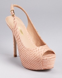 Scaly, snakeskin embossed leather takes form in neutral nude, creating a towering (and leg-lengthening) look. From Pour La Victoire. Scaly, snakeskin embossed leather takes form in neutral nude, creating a towering (and leg-lengthening) look. From Pour La Victoire.