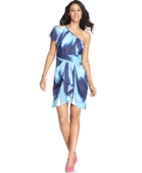 Flirty features make Vince Camuto's dress a must-have this season. Asymmetrical details, a shoulder cutout and a cascading ruffle at the front skirt are all show-stoppers. Flirty features make Vince Camuto's dress a must-have this season. Asymmetrical details, a shoulder cutout and a cascading ruffle at the front skirt are all show-stoppers.