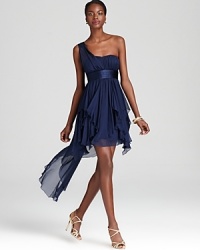ABS by Allen Schwartz's one shoulder dress boasts chic flair with satin trim and a handkerchief hem. ABS by Allen Schwartz's one shoulder dress boasts chic flair with satin trim and a handkerchief hem.