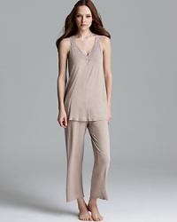 Lounge around in style with a soft V-neck tank and matching capri pants from Midnight by Carole Hochman. Lounge around in style with a soft V-neck tank and matching capri pants from Midnight by Carole Hochman.