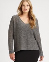 A shimmering display of sophistication, a pullover design made from Italian fabrication. It will look phenomenal with straight-leg pants or skinnies.ScoopneckDolman sleevesRibbed-knit cuffsPull-on styleAbout 23 from shoulder to hemViscose/nylon/alpaca/metallic thread/woolDry cleanImported of Italian fabric