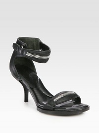 Casual leather silhouette with zipper details and a wrap-around ankle strap. Stacked heel, 3Leather upperLeather lining and solePadded insoleImportedOUR FIT MODEL RECOMMENDS ordering true size. Casual leather silhouette with zipper details and a wrap-around ankle strap. Stacked heel, 3Leather upperLeather lining and solePadded insoleImportedOUR FIT MODEL RECOMMENDS ordering true size.