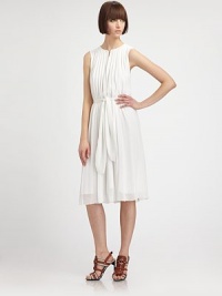Finely pleated silk drapes on this feminine silhouette, with delicate semi-sheer overlay for an ethereal effect. Slit jewelneck with hook closureWide shoulder strapsSleevelessAllover pleatsSelf-tie belted waistDual front slash pocketsAbout 27 from natural waistSilkDry cleanImportedModel shown is 5'10.5 (179cm) wearing US size 4.OUR FIT MODEL RECOMMENDS ordering one size down as this style runs large. Finely pleated silk drapes on this feminine silhouette, with delicate semi-sheer overlay for an ethereal effect. Slit jewelneck with hook closureWide shoulder strapsSleevelessAllover pleatsSelf-tie belted waistDual front slash pocketsAbout 27 from natural waistSilkDry cleanImportedModel shown is 5'10.5 (179cm) wearing US size 4.OUR FIT MODEL RECOMMENDS ordering one size down as this style runs large.