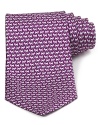 A pack of jaunty schnauzers patterns this luxurious silk tie, rendered in a classic silhouette for traditional appeal.