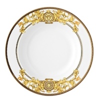 The most legendary figure of Asian mythology, the red dragon rises majestically from this fabulously opulent dinnerware from Rosenthal Meets Versace, conveying all its might and glory. Each piece features ornate golden baroque patterns and four small medallions representing the sun, and the Versace medusa decorates the background. The most legendary figure of Asian mythology, the red dragon rises majestically from this fabulously opulent dinnerware from Rosenthal Meets Versace, conveying all its might and glory. Each piece features ornate golden baroque patterns and four small medallions representing the sun, and the Versace medusa decorates the background.
