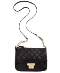 Elegant and understated, this luxe leather crossbody from Calvin Klein makes any ensemble more alluring. With chain-link details, signature turn lock closure and quilted flap accent, it's no wonder this silhouette is such a stunner. Elegant and understated, this luxe leather crossbody from Calvin Klein makes any ensemble more alluring. With chain-link details, signature turn lock closure and quilted flap accent, it's no wonder this silhouette is such a stunner.