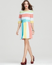 Sherbet-inspired hues brighten up this whimsical striped Alice + Olivia day dress. Sherbet-inspired hues brighten up this whimsical striped Alice + Olivia day dress.