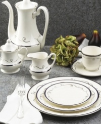 Set the table with charm and delight with the Infinity collection form Pickard. This graceful pattern features midnight blue bands framed by platinum and accented further by a whimsical, free-flowing, platinum ribbon. Oval vegetable bowl not shown. Set the table with charm and delight with the Infinity collection form Pickard. This graceful pattern features midnight blue bands framed by platinum and accented further by a whimsical, free-flowing, platinum ribbon. Oval vegetable bowl not shown.