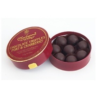 Dark chocolate enrobed truffles filled with a ganache center made with port and cranberries. Dark chocolate enrobed truffles filled with a ganache center made with port and cranberries.