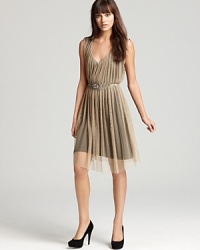 Vintage inspired and beautifully embellished with delicate beaded detail, this divine Akiko dress evokes subtle glamour with a peekaboo mesh overlay and alluring sheer back. Vintage inspired and beautifully embellished with delicate beaded detail, this divine Akiko dress evokes subtle glamour with a peekaboo mesh overlay and alluring sheer back.