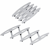 Designed in Germany, this stainless steel expandable trivet adds a bold, contemporary touch to your table. Designed in Germany, this stainless steel expandable trivet adds a bold, contemporary touch to your table.