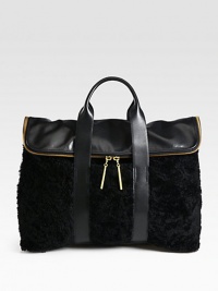 A mix of smooth leather and luxurious shearling come together in an elegant and distinctive style, perfectly sized for all your essentials.Double top handles, 4 dropFold-over zip closureOne inside zip pocketFully lined16¼W X 12½H X 6¾DImported A mix of smooth leather and luxurious shearling come together in an elegant and distinctive style, perfectly sized for all your essentials.Double top handles, 4 dropFold-over zip closureOne inside zip pocketFully lined16¼W X 12½H X 6¾DImported