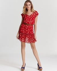 This Ella Moss dress works its feminine wiles with a dainty floral print and ruffled hem. A faux-leather braided belt finishes the look to summer perfection. This Ella Moss dress works its feminine wiles with a dainty floral print and ruffled hem. A faux-leather braided belt finishes the look to summer perfection.