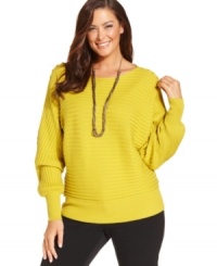 Cozy up to the chic comfort of Alfani's long sleeve plus size sweater-- pair it with your favorite casual bottoms. Cozy up to the chic comfort of Alfani's long sleeve plus size sweater-- pair it with your favorite casual bottoms.