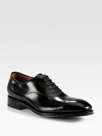 Simple luxury defines this modern lace-up style rendered in exceptionally smooth Italian leather with a signature captoe finish.Leather upperLeather liningPadded insoleLeather soleMade in ItalyThis style runs true to size. We recommend ordering your usual size for a standard fit. Simple luxury defines this modern lace-up style rendered in exceptionally smooth Italian leather with a signature captoe finish.Leather upperLeather liningPadded insoleLeather soleMade in ItalyThis style runs true to size. We recommend ordering your usual size for a standard fit.