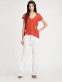 Lightweight, semi-sheer linen basic will transition smoothly from the beach to the lavish rooftop party. Elastic waistband with drawstringFront patch pocketsBack patch pocketsInseam, 31LinenDry cleanMade in USA of imported fabricModel shown is 5'10 (177cm) wearing US size Small. Lightweight, semi-sheer linen basic will transition smoothly from the beach to the lavish rooftop party. Elastic waistband with drawstringFront patch pocketsBack patch pocketsInseam, 31LinenDry cleanMade in USA of imported fabricModel shown is 5'10 (177cm) wearing US size Small.
