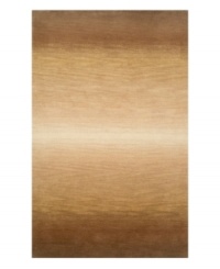 A true natural beauty, this rug uses organic tones of brown and tan to form a wonderfully textured gradient, culminating at the center with a brilliant burst of light. Hand-tufted and color blended with the greatest of care, this wool rug comes alive with texture and color. A true natural beauty, this rug uses organic tones of brown and tan to form a wonderfully textured gradient, culminating at the center with a brilliant burst of light. Hand-tufted and color blended with the greatest of care, this wool rug comes alive with texture and color.