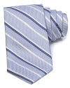 Diagonal stripes dash across a textured silk tie from The Men's Store at Bloomingdale's.