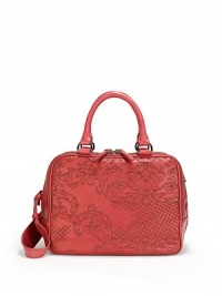 THE LOOKTubular leather double top handlesRemovable shoulder strap with cone studsRectangular shapeTop zip closuresEtched floral jacquard design on the frontThree zip compartmentsOne inside zip pocketTwo inside open pocketsInside logo detailTHE MEASUREMENTDouble top handles, 6 dropShoulder strap, 13 drop11W X 7H X 9DTHE MATERIALLeatherLogo printed liningORIGINImported THE LOOKTubular leather double top handlesRemovable shoulder strap with cone studsRectangular shapeTop zip closuresEtched floral jacquard design on the frontThree zip compartmentsOne inside zip pocketTwo inside open pocketsInside logo detailTHE MEASUREMENTDouble top handles, 6 dropShoulder strap, 13 drop11W X 7H X 9DTHE MATERIALLeatherLogo printed liningORIGINImported