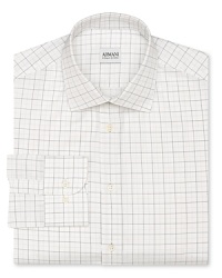 A measured tattersall design composed of thin, subtle lines highlights this refined cotton dress shirt, tailored for a contemporary fit to mesh seamlessly with your modern wardrobe. A measured tattersall design composed of thin, subtle lines highlights this refined cotton dress shirt, tailored for a contemporary fit to mesh seamlessly with your modern wardrobe.