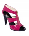 Bright and lovely. MICHAEL Michael Kors' Berkely sandals feature a zip-up t-strap with super trendy cutouts on the sides.