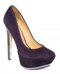 A sliver of metal along the platform of L.A.M.B.'s Delores pumps updates this classic silhouette with such sophisticated glamour. A sliver of metal along the platform of L.A.M.B.'s Delores pumps updates this classic silhouette with such sophisticated glamour.