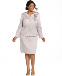 Kasper's plus size skirt suit is elevated with a stunning textured pattern and beautiful details, like jeweled buttons and a flower embellishment at the left shoulder.