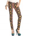 Get bright: a super-vivacious snakeskin-print brings trend-right style to a pair of five-pocket skinny jeans that won't be ignored! From Celebrity Pink Jeans.