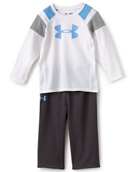 This sporty set from Under Armour outfits your little athlete with comfortable, breathable duds that'll keep him wiggling and giggling all day long. This sporty set from Under Armour outfits your little athlete with comfortable, breathable duds that'll keep him wiggling and giggling all day long.